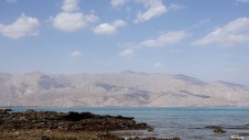 View from the beach to the Musandam mountains, Oman...